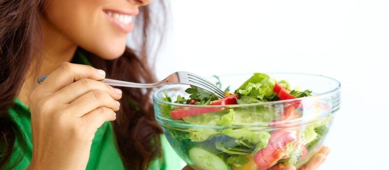 woman eating a salad